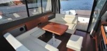 Yachtcharter Jeanneau NC 11 (2Cab/1WC) Salon